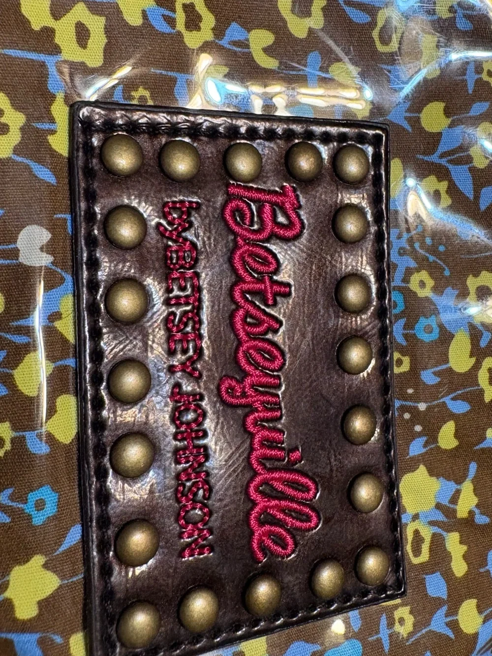 Betsey Johnson Brown Floral Coated Cosmetic Bag with Yellow & Blue Accents